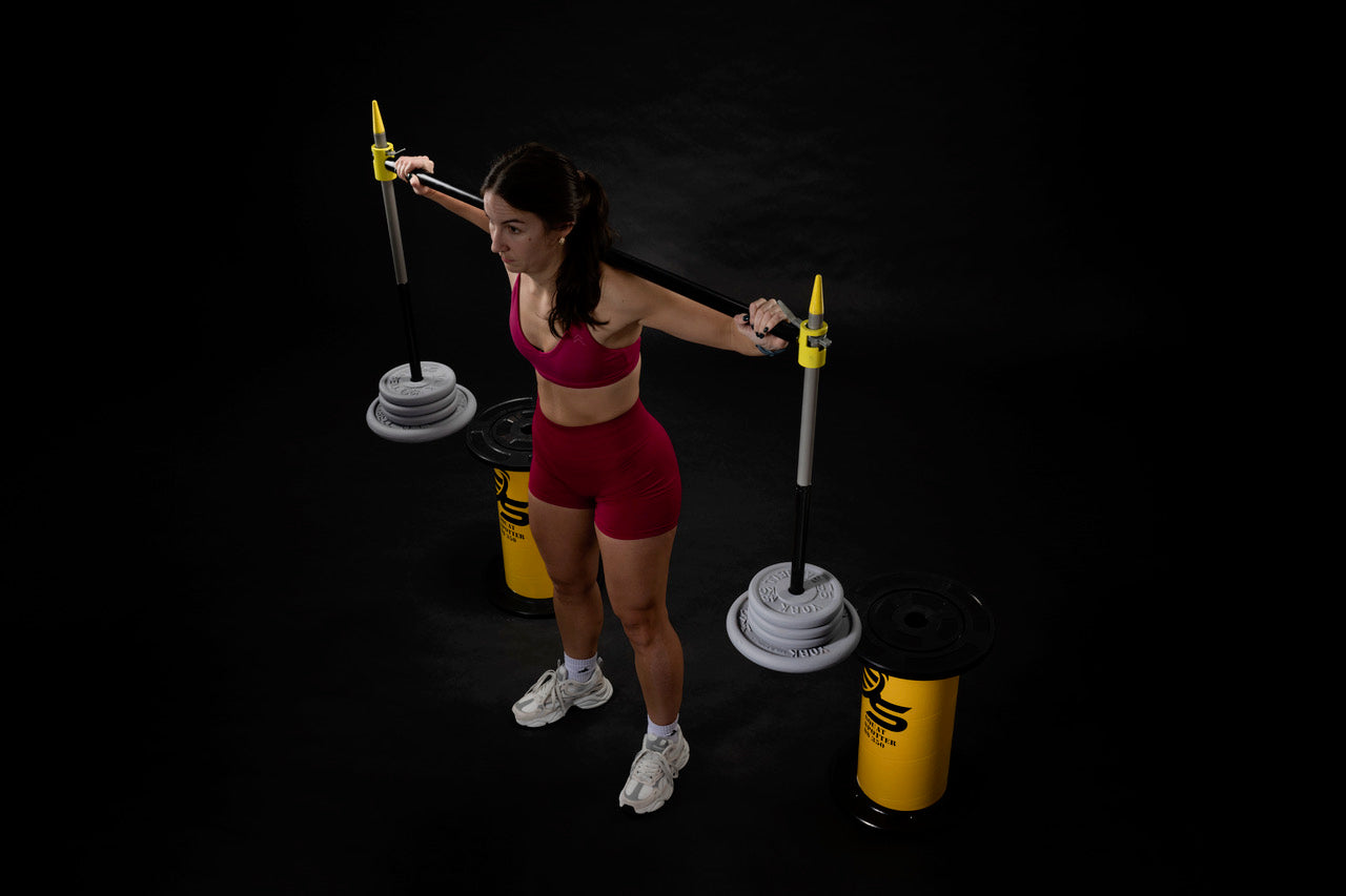 Athlete using squat spotter start position